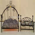 wrought iron pet bed and matching feeder